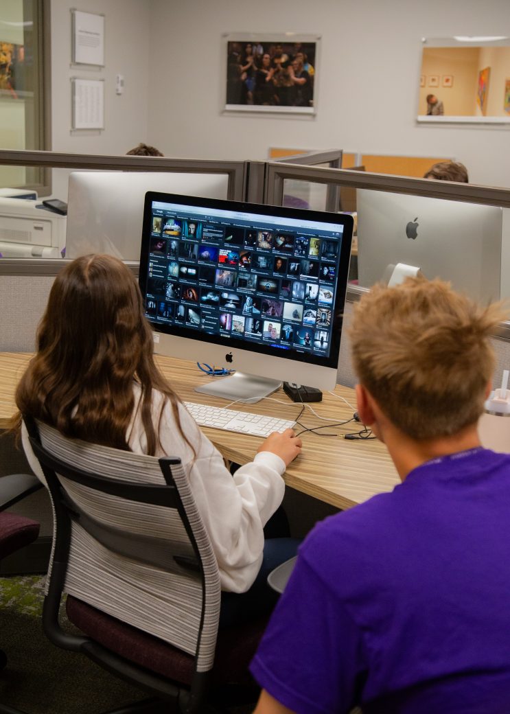 Teen learning something at the computer