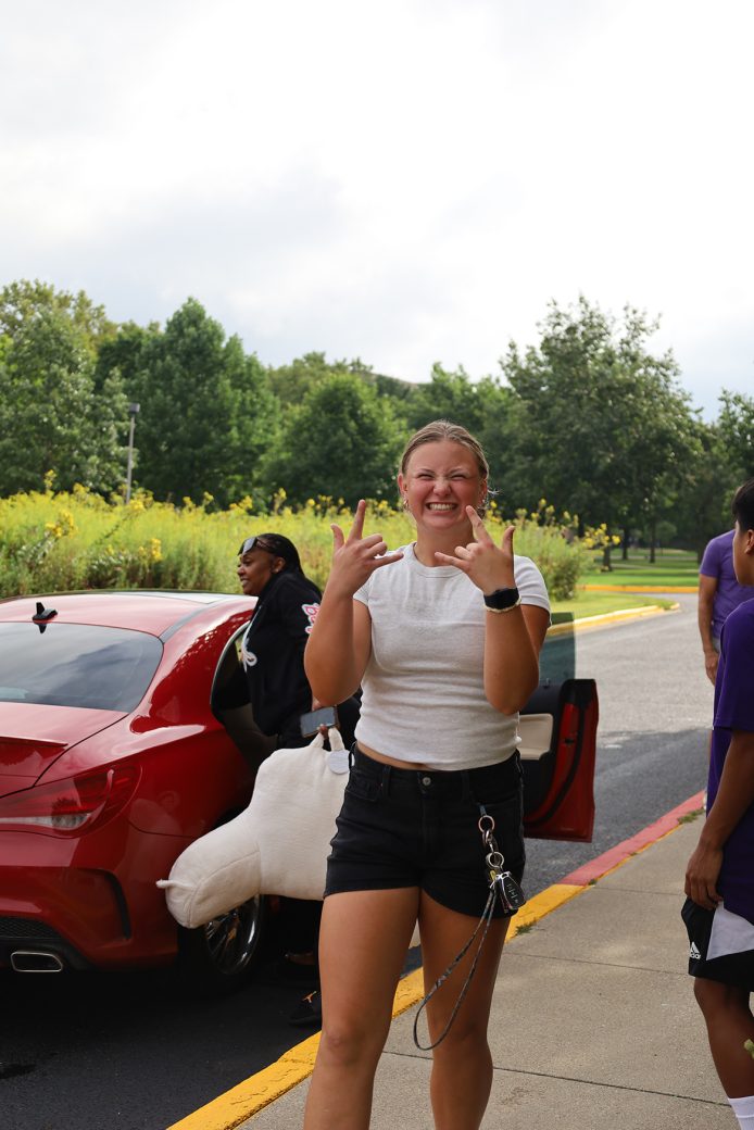 Gosehn college student stricking a pose