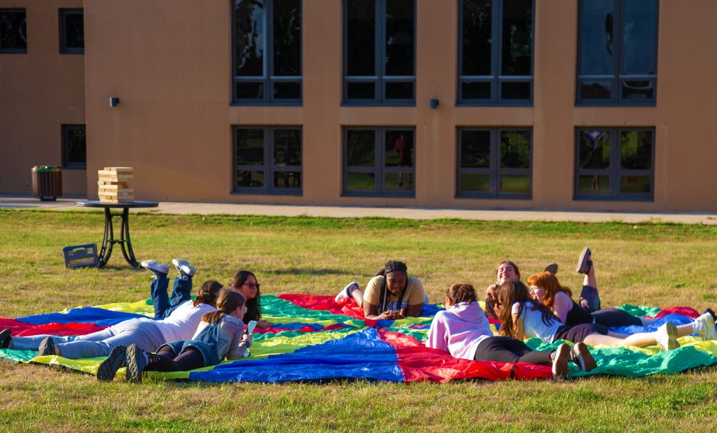 Goshen college students Lying in the sun