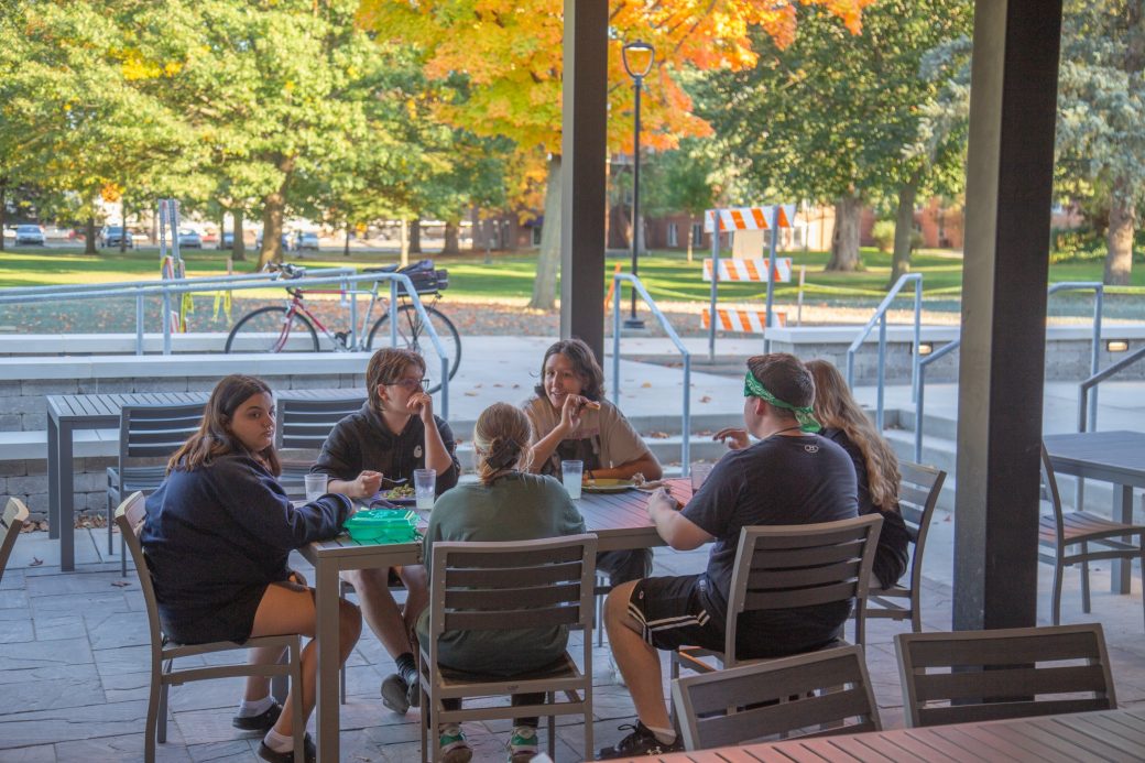 Goshen colege students eating and talking at Westlawn Dining Hall