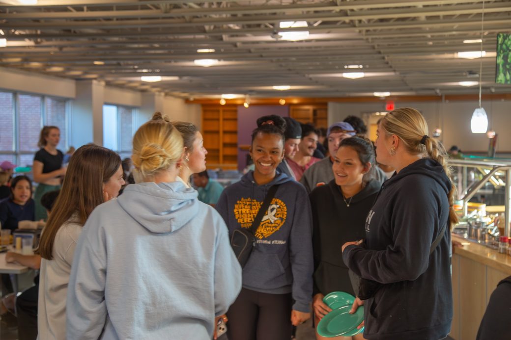 Goshen college students talking at Westlawn Dining Hall