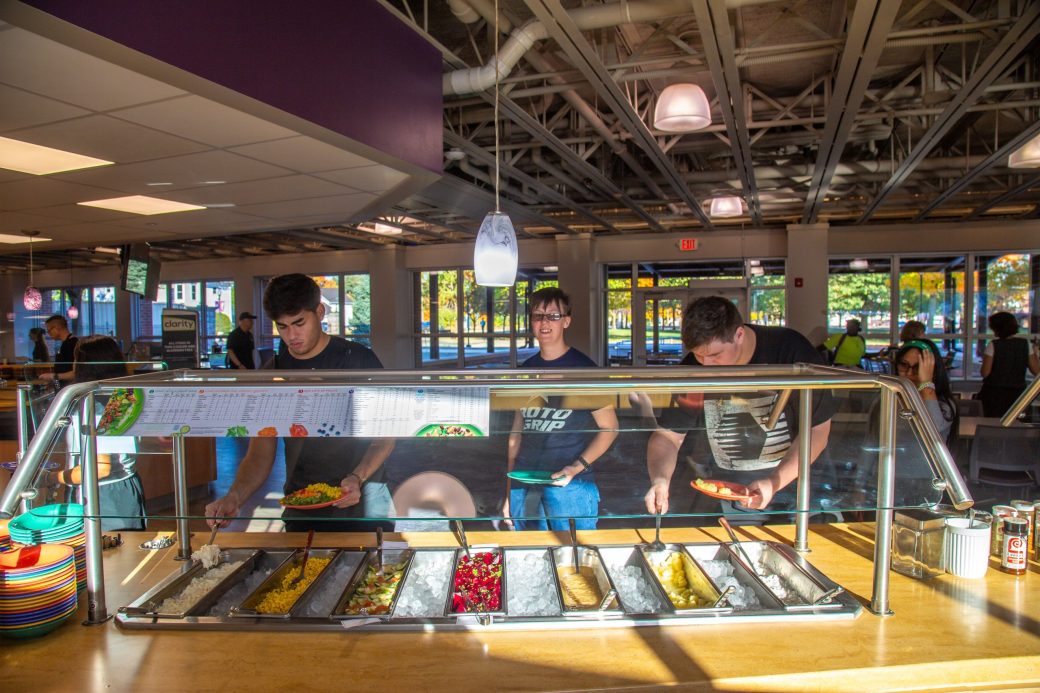 Students serve themselves in the dining hall