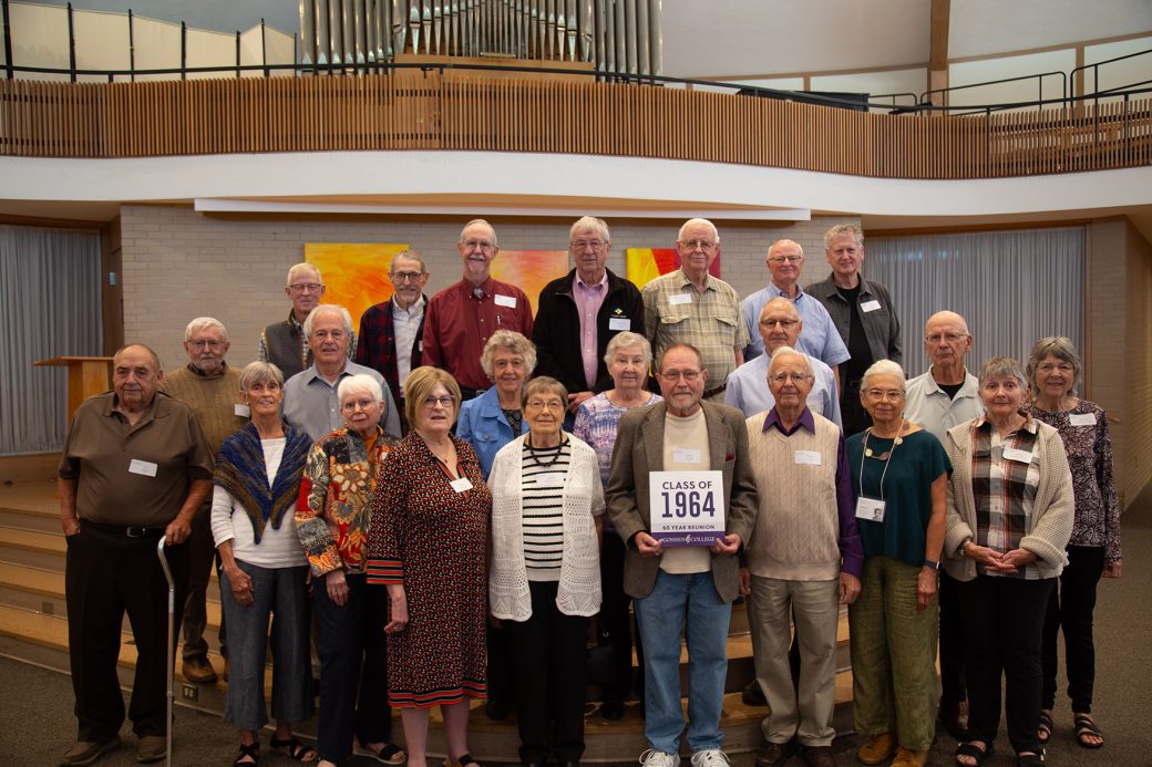 People smiling to the camera at Class Reunions 2024