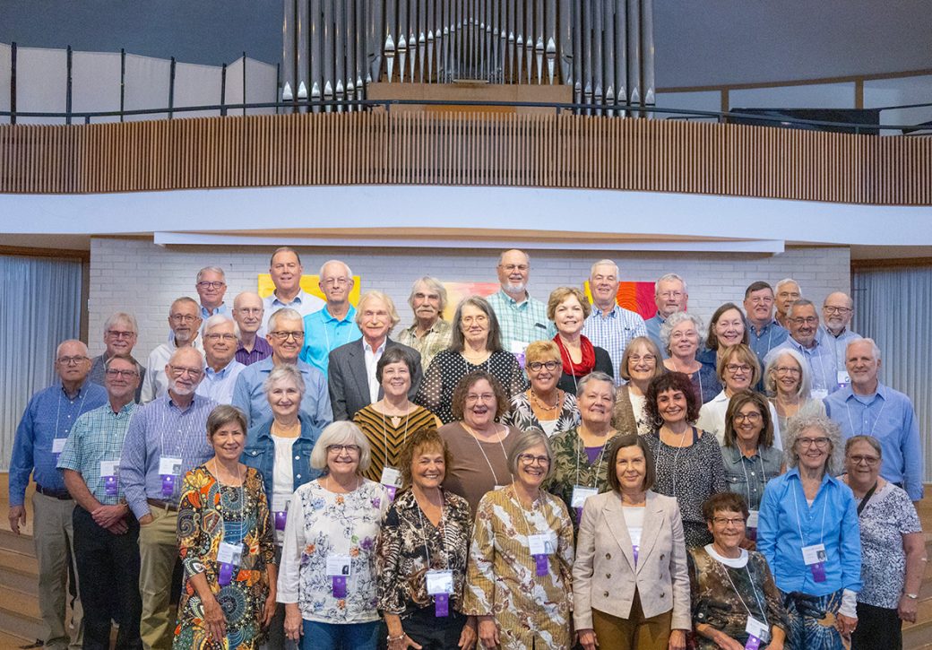 People smiling to the camera at Class Reunions 2024