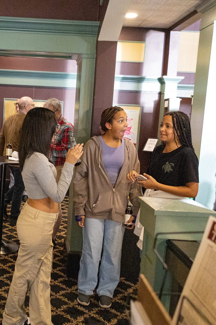 Three woman talking at Connectapalooza