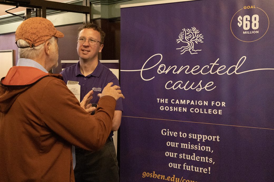 Two man talking at Connectapalooza