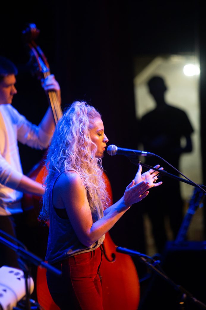 Woman singing at Conctpalooza