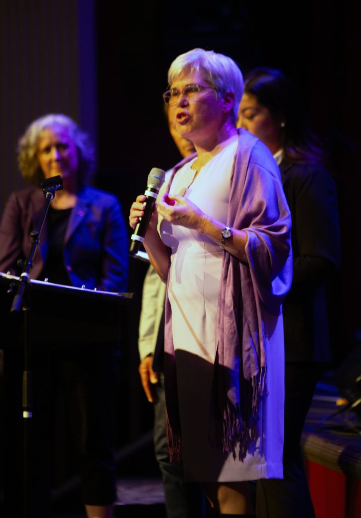 Woman giving a speech at Connectpalooza