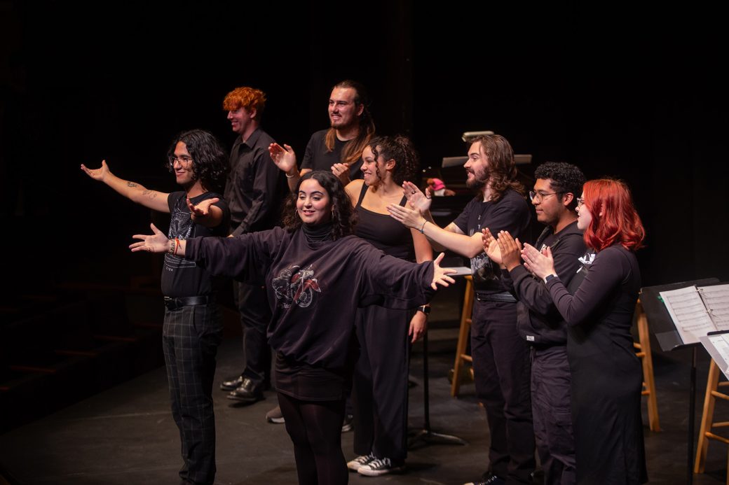 Music choir members doing a performance at Homecoming weekend 2024