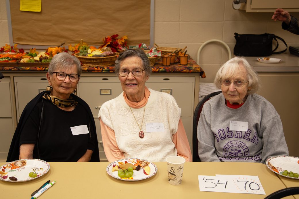 Three woman smilig to the camera at Class Reunions 2024