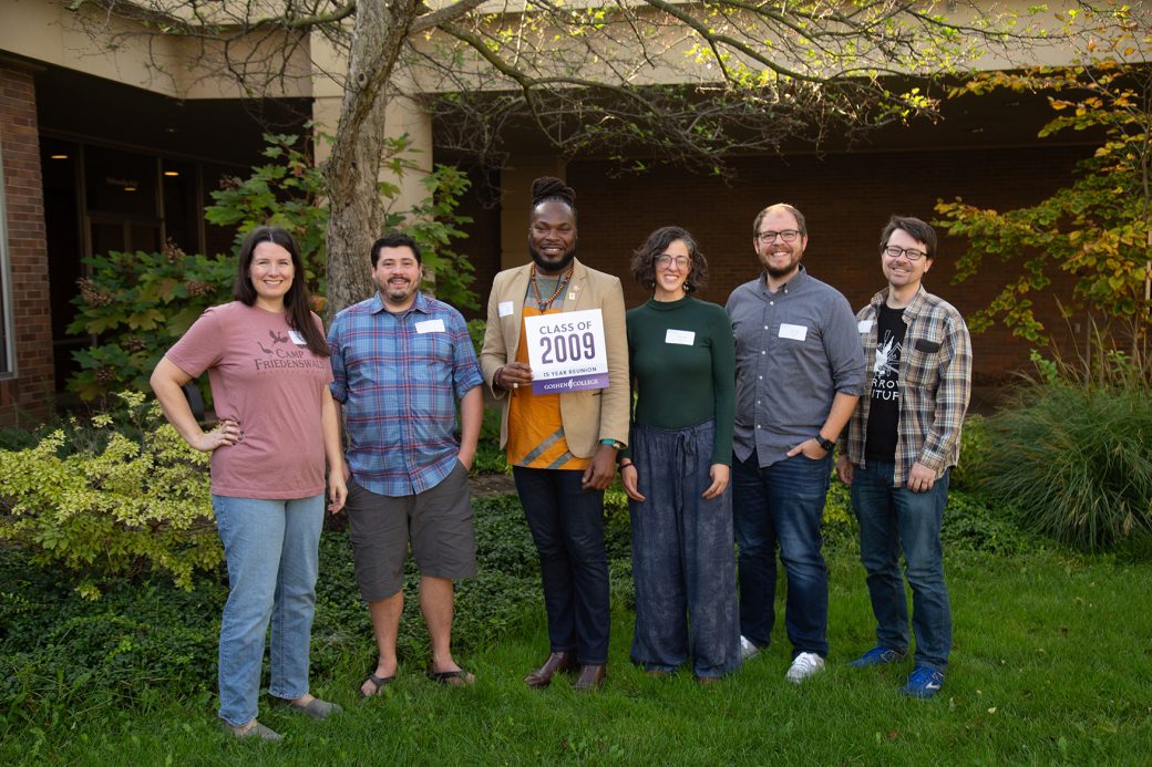 People smiling to the camera at Class Reunions 2024