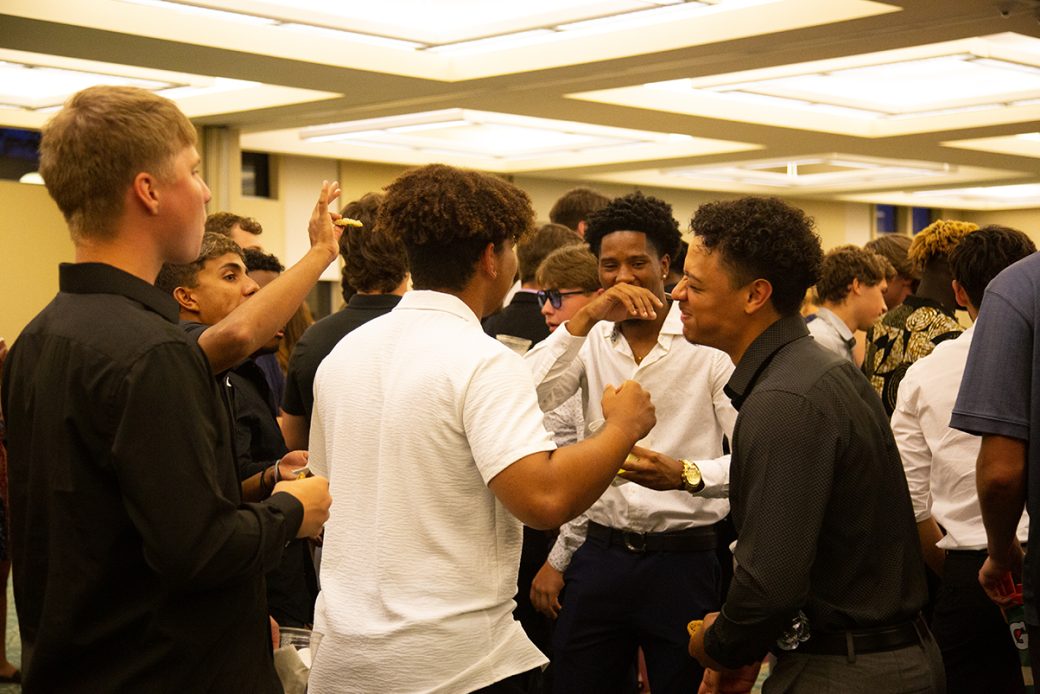 Young boys talking at Goshen college