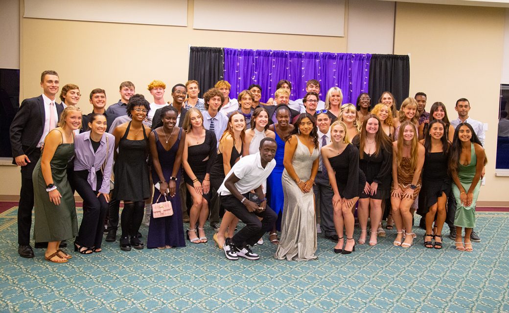 People smiling to the camera at LEAFYs athletic award ceremony