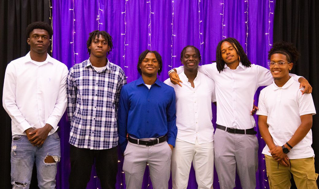 Young boys smilig to the camera at LEAFYs athletic award ceremony