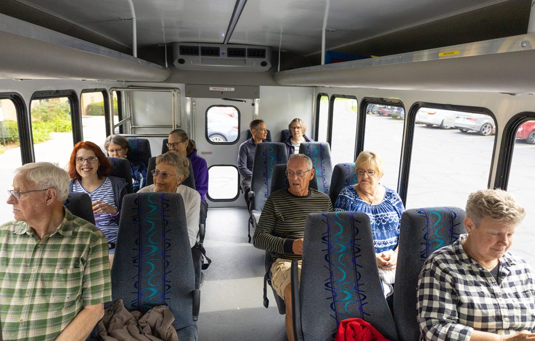 People in a bus at Homecoming Weekend 2024