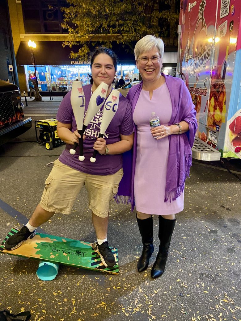 Two women hugging at Connectapalooza
