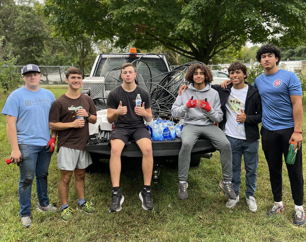 Mens hugging in a pickup truck