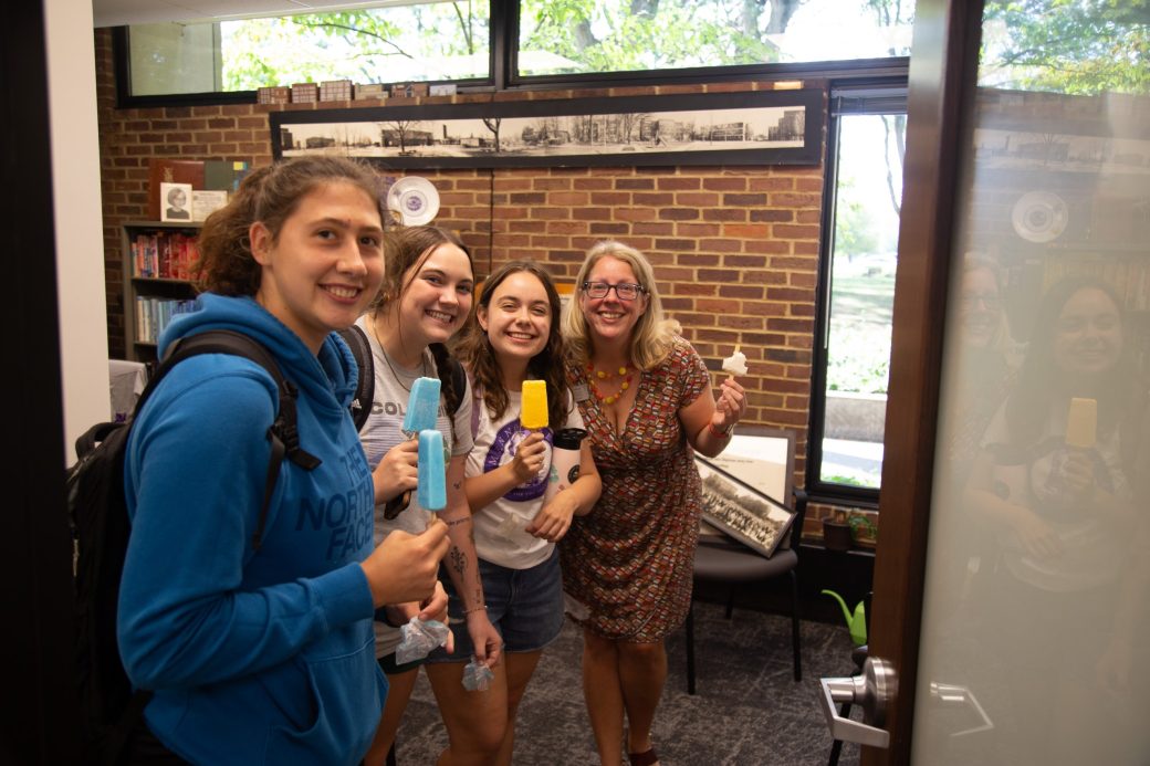 Four womans hugging at Goshen college