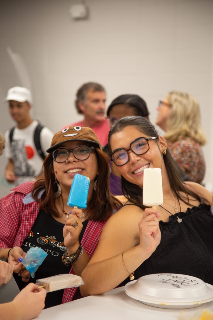 Goshen college students with popsicle