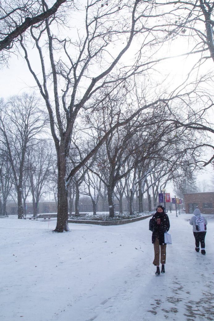 Students of Gohen college walking in the snow