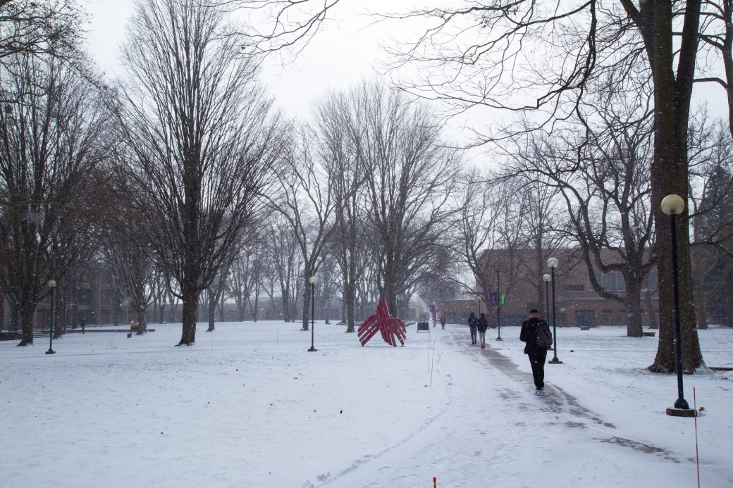 Goshen college students walking around of the Goshenb college