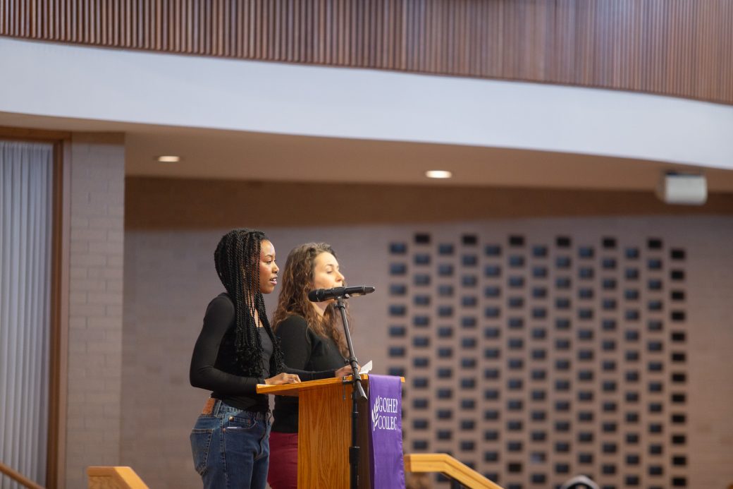 Goshen college student giving a speech in the chapel