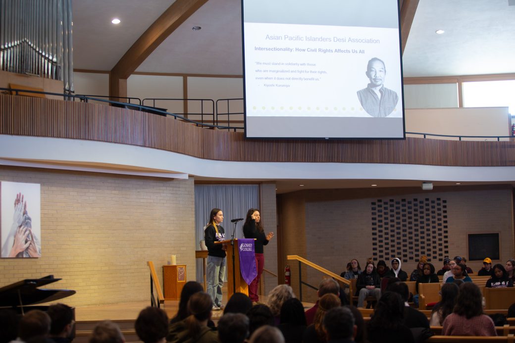 Goshen college student giving a speech in the chapel