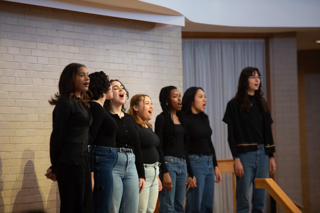 Goshen college students singing at MLK celebration