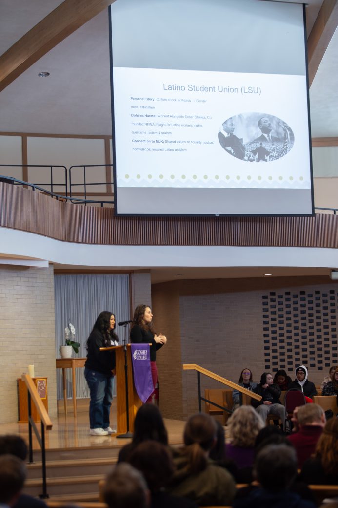 Goshen college student giving a speech in the chapel