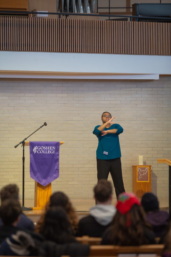 Sign language speaker making gestures in sign language at Martin Luther King, Jr. 2025 Celebration