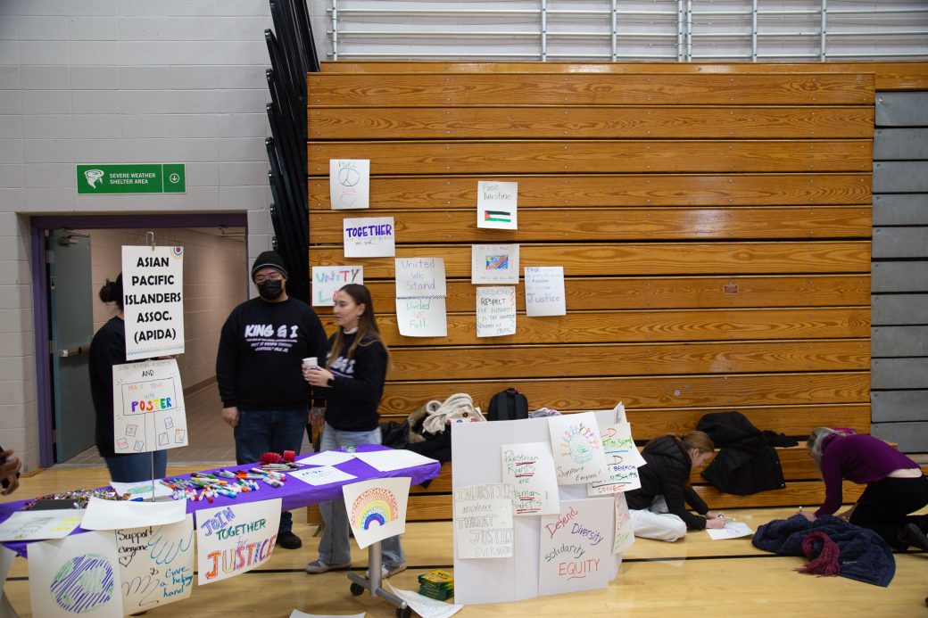 Goshen college students doing a board presentation