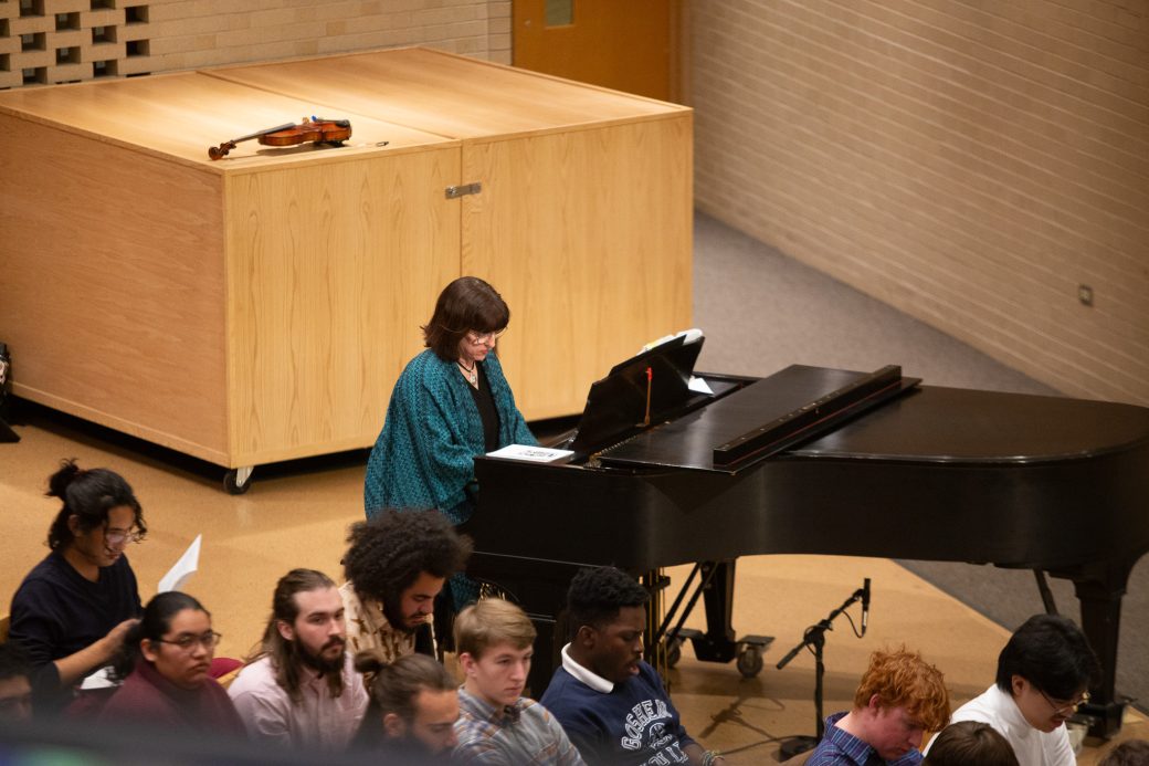Woman playing piano at Anabaptism Celebration