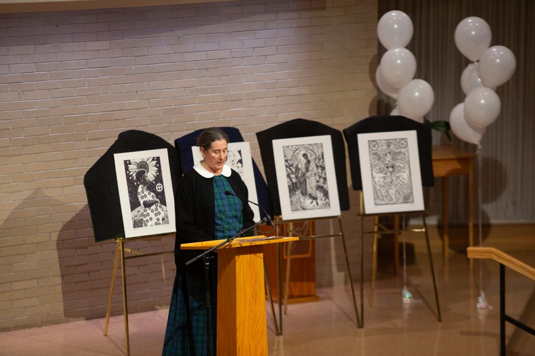 Woman doing a speech at stage's pulpit