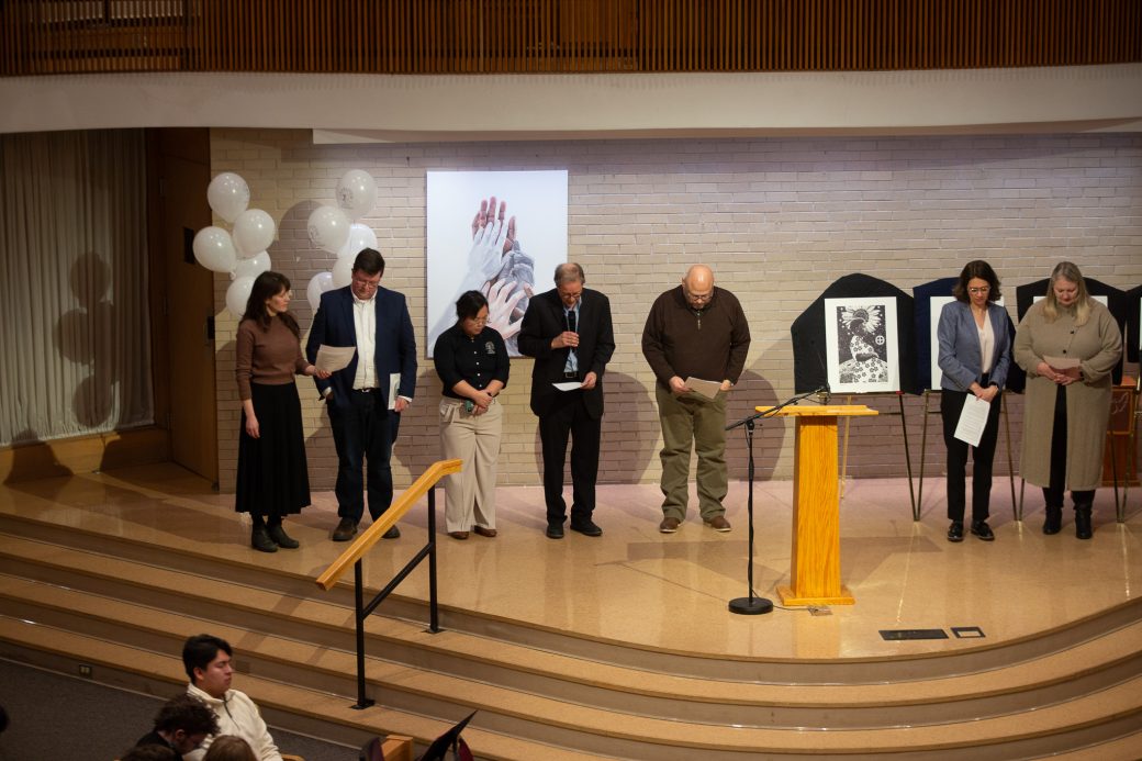 People at the stage in the chapel