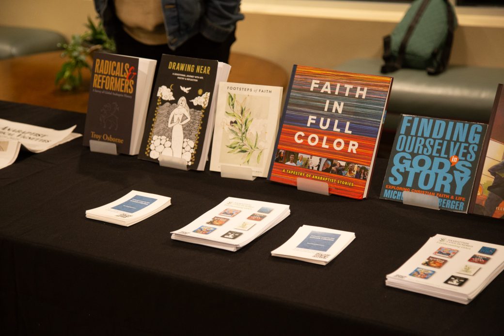 Books in a table at Anabaptism Celebration
