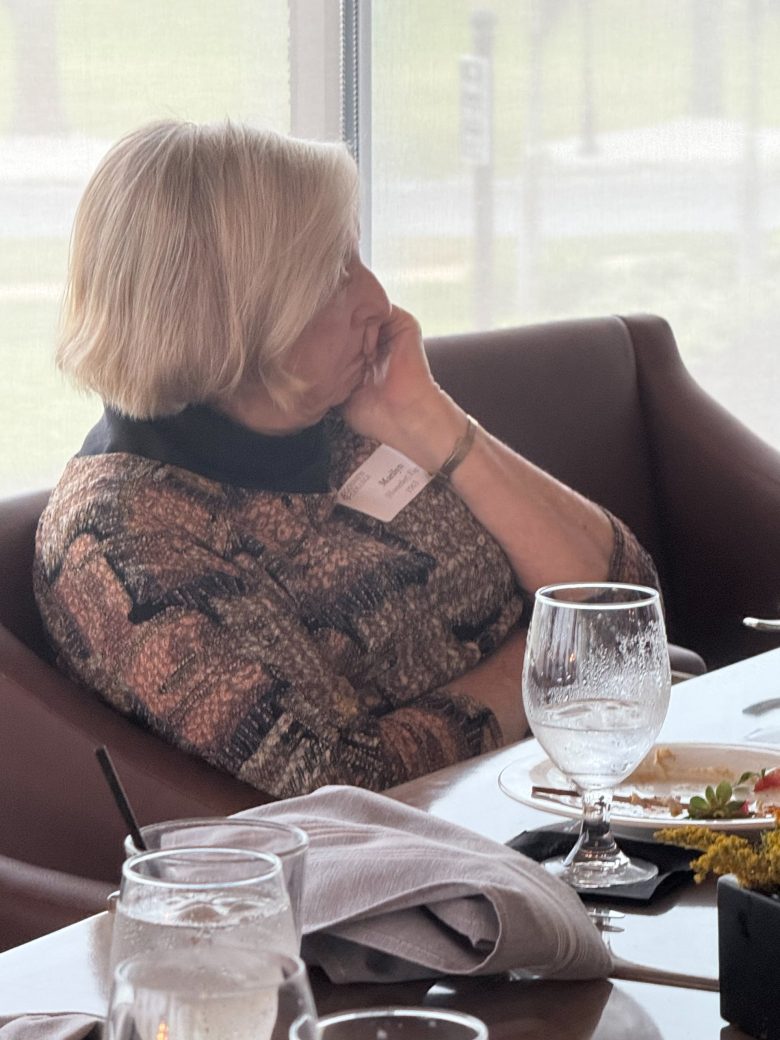 Woman seated at Connected Cause Alumni & Friends Gathering: Sarasota, Florida