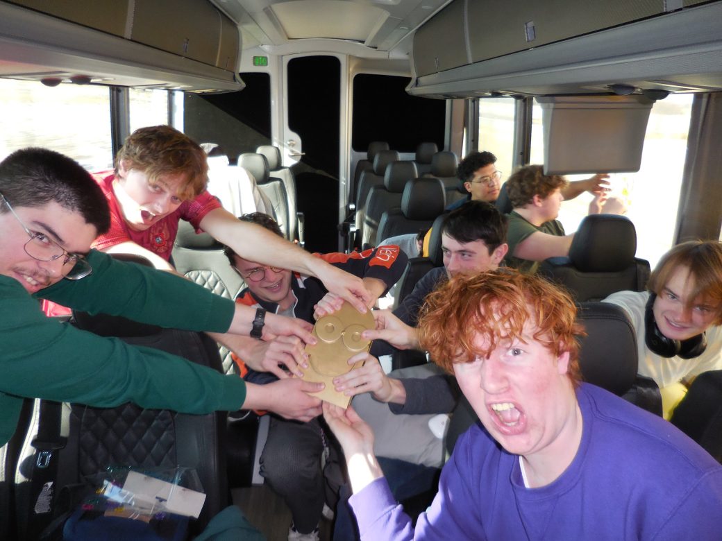 Students of the Goshen college at a bus