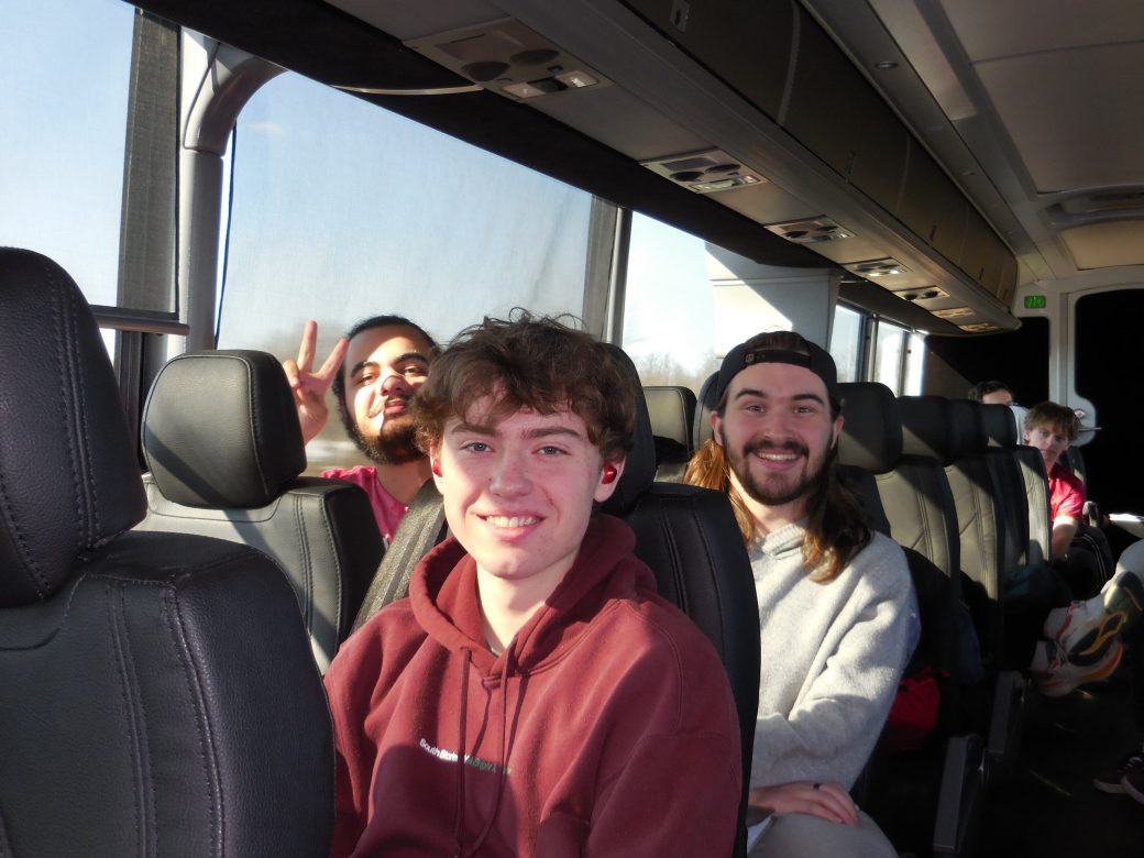Students of the Goshen college at a bus