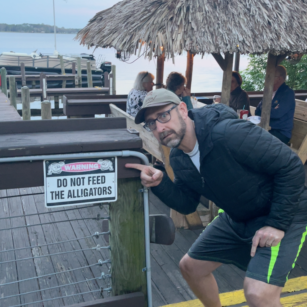 man pointing to the warning