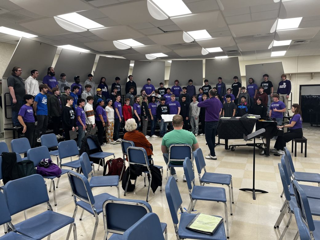 Goshen University students practicing songs