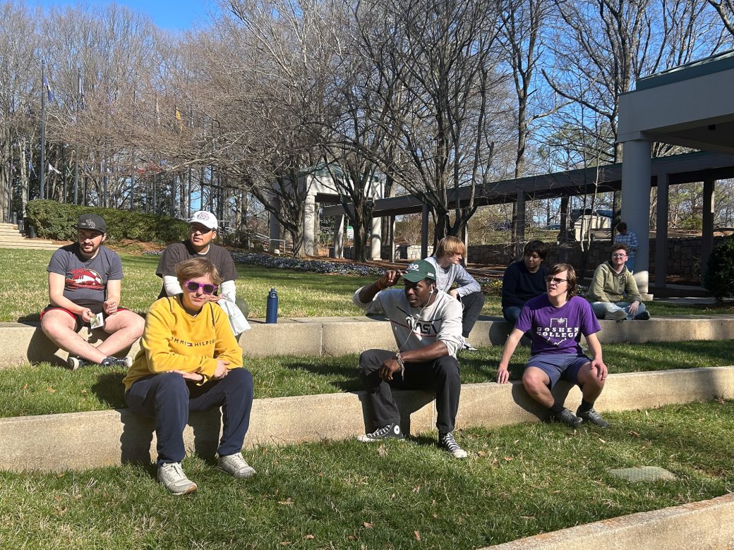 Goshen's college students smiling to the camera