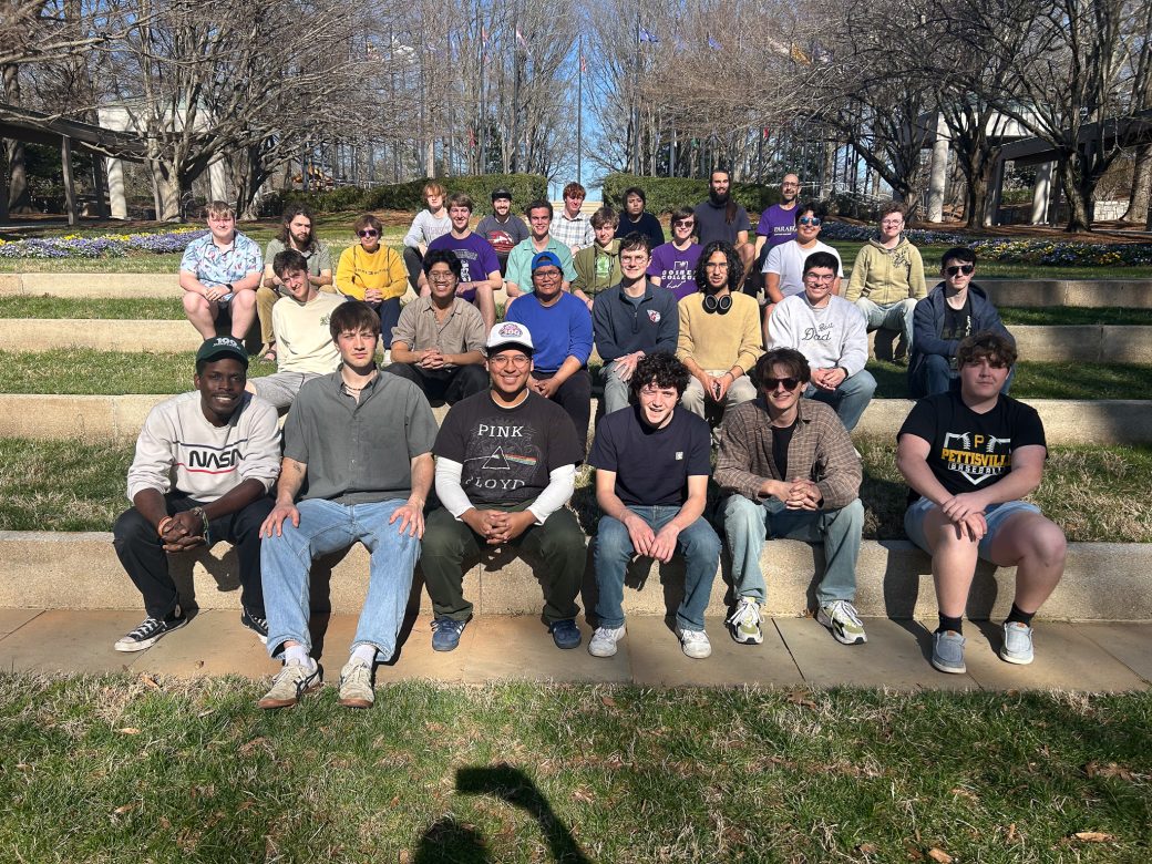 Goshen's college students smiling to the camera