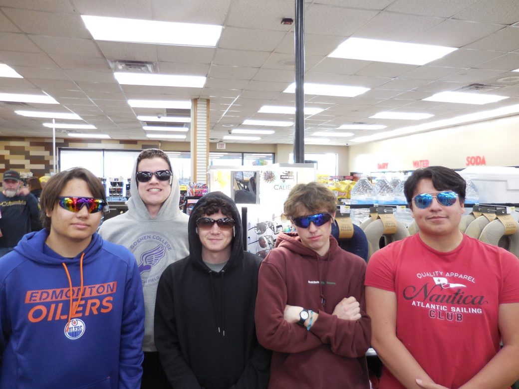 Goshen's college students smiling to the camera