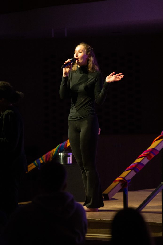 presenter of Goshen Monologues 2025 at the stage doing a speech