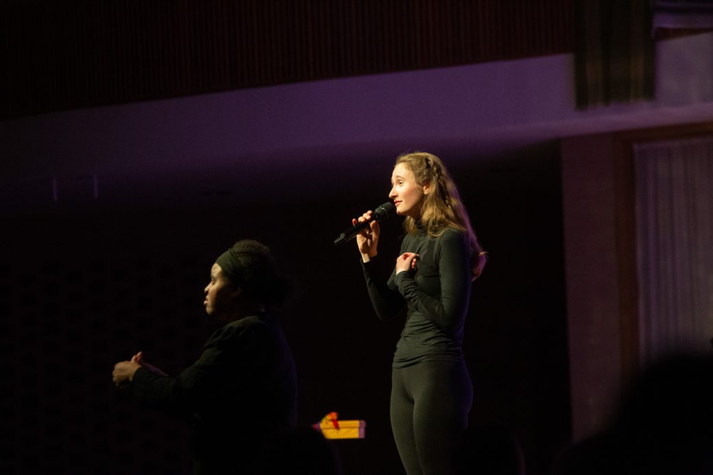presenter of Goshen Monologues 2025 at the stage doing a speech