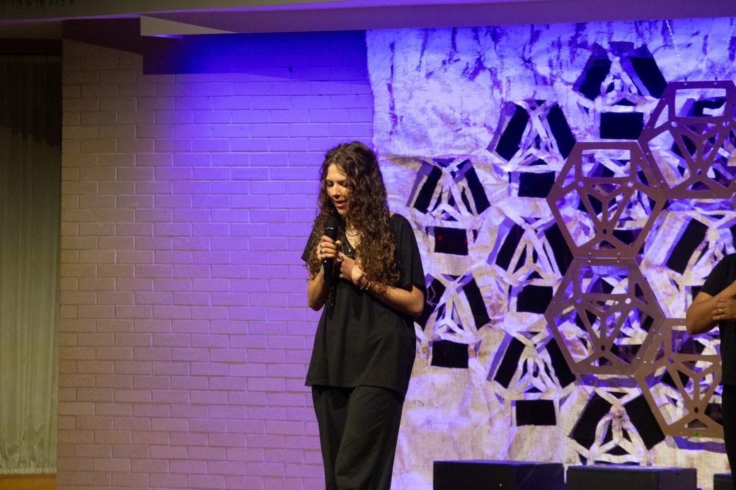presenter of Goshen Monologues 2025 at the stage doing a speech