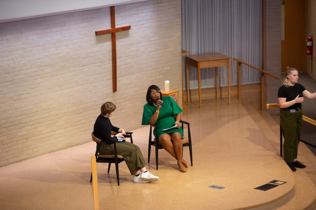 Women seated doing a speech at Community Engagement