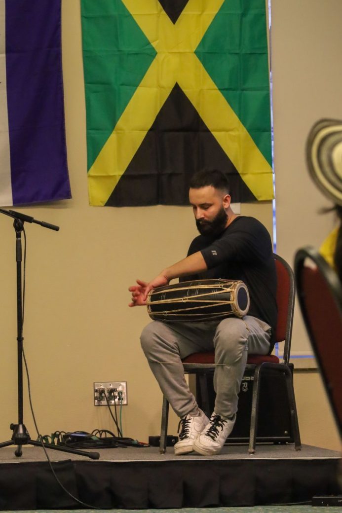 student playing percussion