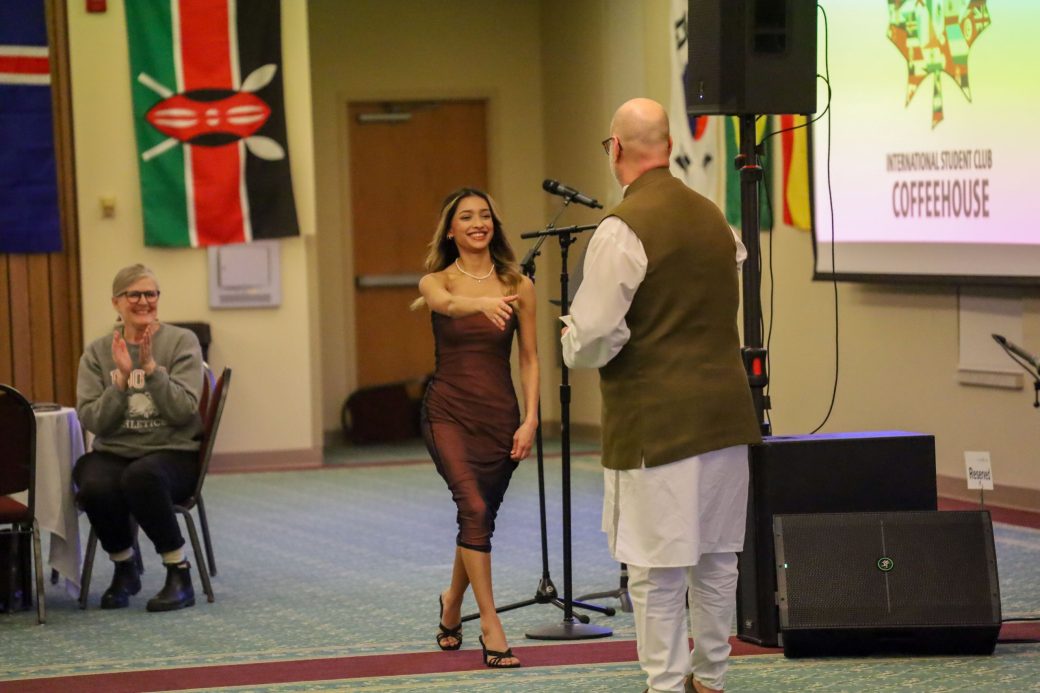Goshen College student receiving a award for her academic performance