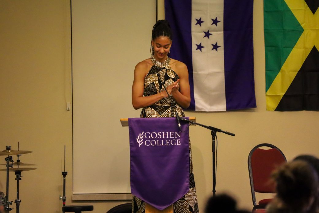 A woman speaking to the crowd